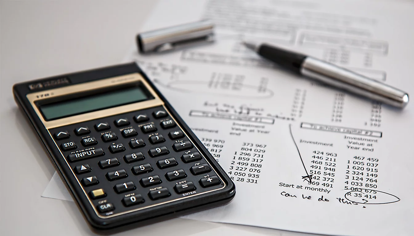 Financial statements and a calculator representing cash runway analysis from SEC filings
