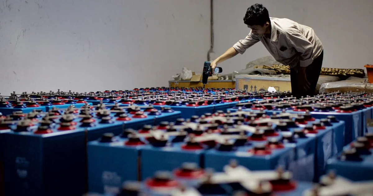Cylindrical lithium-ion battery cells on a manufacturing line